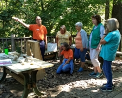 Eddie Jones and Marty Schmitt work with Volunteer Educator trainees Pam Walsh, Barbara Lehmier, Ann Niemann and Donna Bourisaw.