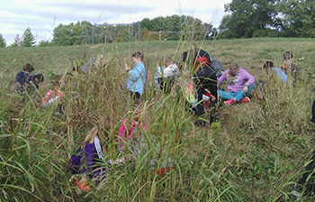 Students together in a prairie on a work day